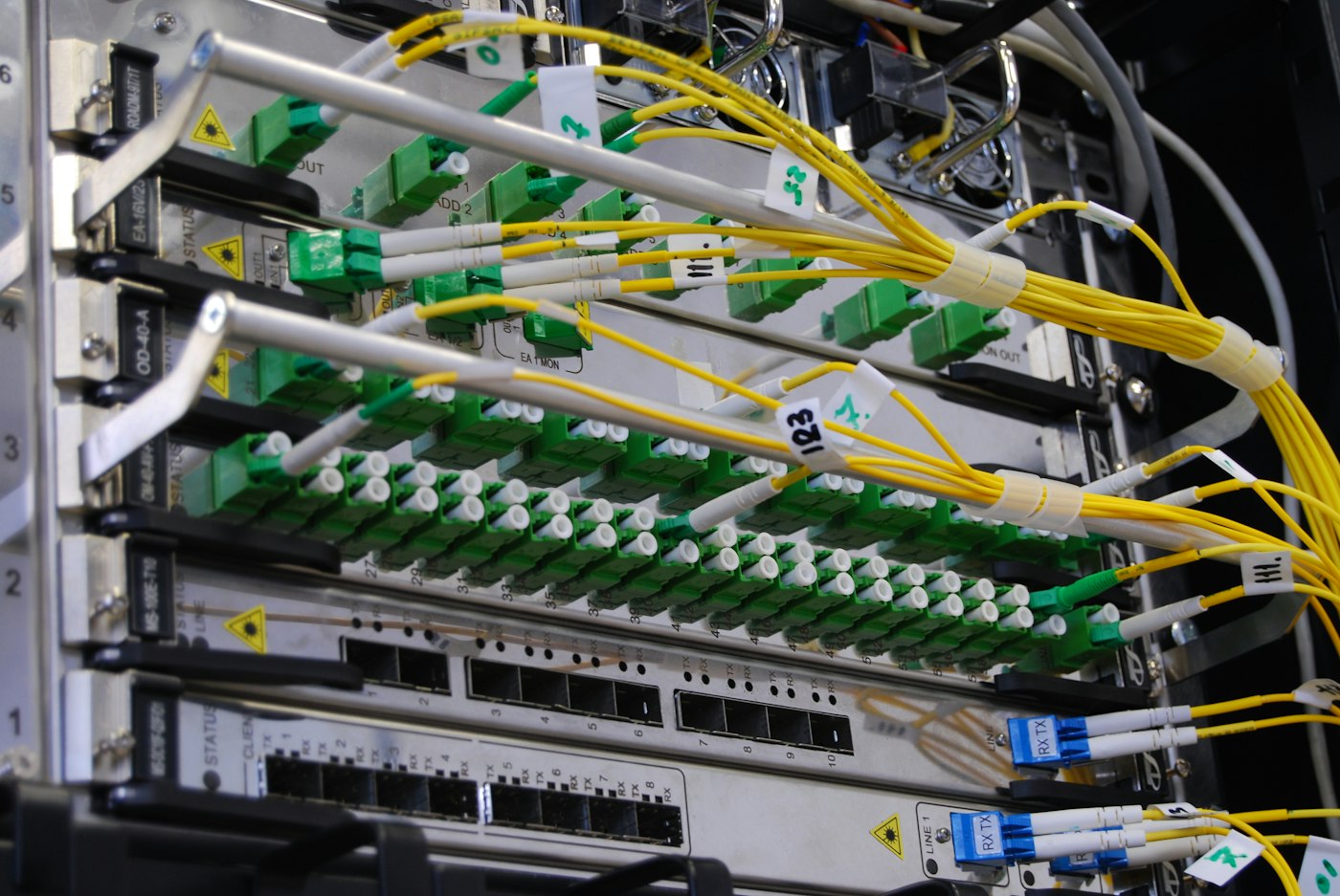 Fibre optic cables patched into a network switch